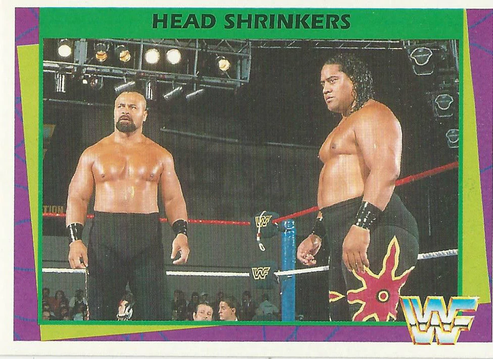 WWF material featuring the new Headshrinkers, including The Barbarian.