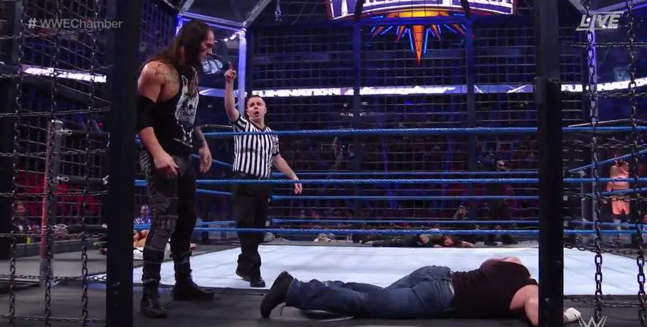 Baron Corbin attacks Dean Ambrose after being eliminated.