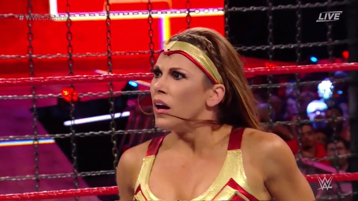Mickie James wrestled in a superhero-inspired attire.