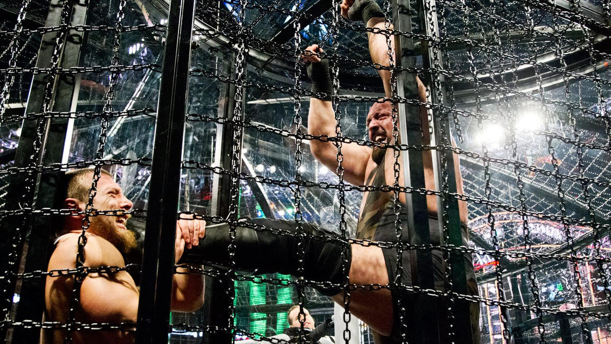 Big Show attacks Daniel Bryan inside of his pod.