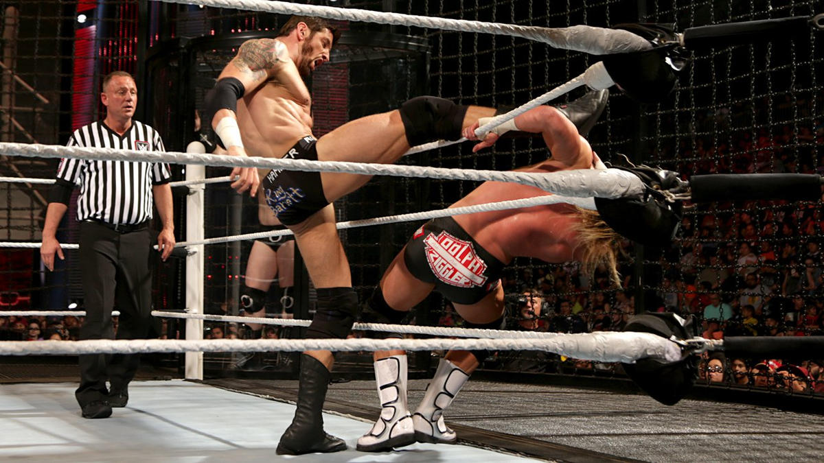 Wade Barrett delivers a big boot to Dolph Ziggler.